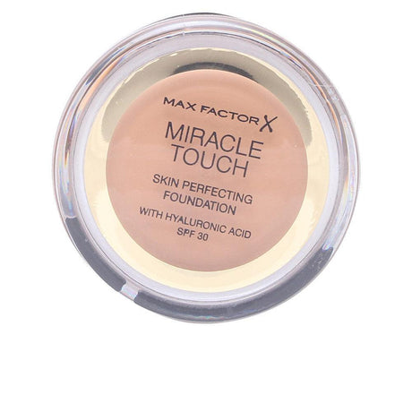 MAX FACTOR MIRACLE TOUCH liquid illusion foundation in Caramel , Makeup by MAX FACTOR. Merkmale: . Verfügbar bei ParfümReich.